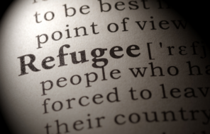 The definition of refugee spotlighted on a page