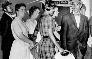 A group of Freedom Riders from Tennessee stands at the door of a Greyhound bus in Birmingham.