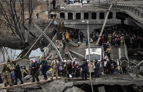 Ukrainian Refugees crossing a fallen bridge