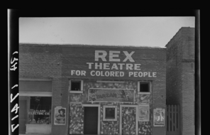 The exterior of a theatre called "Rex Theatre for Colored People."