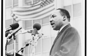 Image of Dr. Martin Luther King, Jr. speaking into a microphone