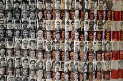 The “Flag of Faces” exhibit at the Ellis Island Immigration Museum features a mosaic of individual portraits.