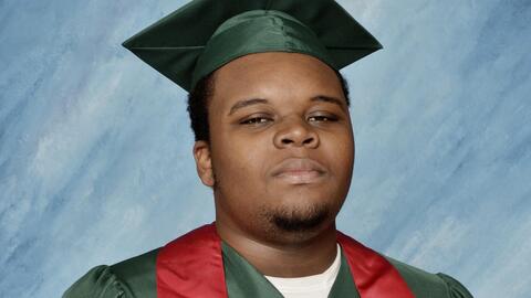 Picture of Michael Brown in Cap and Gown.