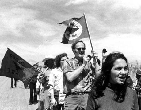 Dolores Huerta marching with protestors.
