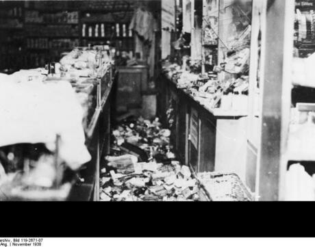 Torn apart shelves and damage in the department store Uhlfelder in Munich during Kristallnacht.